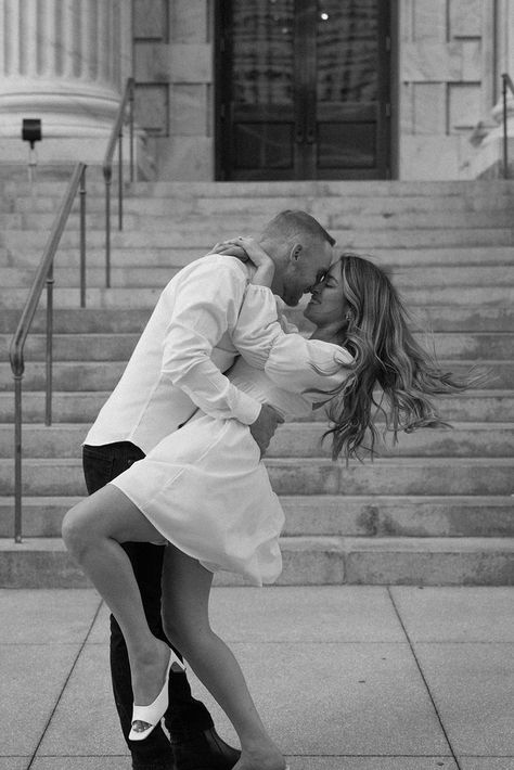 Editorial engagement photoshoot in downtown Tampa. The bride wears a short white bridal dress and the groom wears classic black pants and a white dress shirt Engagement Photoshoot Ideas Editorial, Short Wedding Dress Poses, Engagement Street Photography, Engagement Photoshoot Ideas Charleston, Women Engagement Outfits, Engagement Photo Elegant, Italian Style Engagement Photos, Short Dress Wedding Photos, Lauren Giraldo Engagement