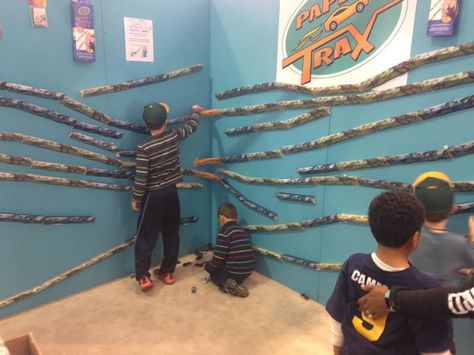 Paper Trax Racing Tracks Takes The Chase Off The Floor And Sticks It To The Wall -  #racing #toys Wall Car Track, Well Paper, Toy Race Cars, New Toy, Kids Growing Up, The Chase, Plastic Toys, Cardboard Crafts, Race Track