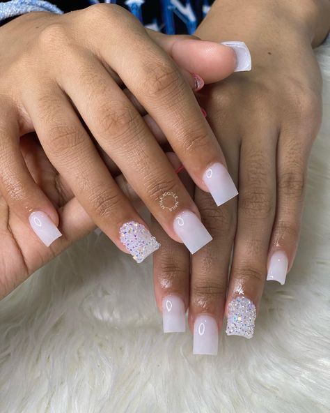 Short white nails are sophisticated and stylish for every occasion. There are many looks to choose, from casual to glam. Check out 19 short white nail ideas. Click the article link for more photos and inspiration like this // Photo Credit: Instagram @__myaa.nicole_nails // #nailaddict #nailart #nailartist #naildesign #naildesigns #nailideas #nailinspiration #nailporn Nails Acrylic Short Pink And White, White Freestyle Nails Acrylic Short, White Silver Nails Short, Short White Nails Diamonds, Cute Gel Nails White, Cute White Short Nails Designs, Homecoming Short Nails, Short Acrylic Nails For Graduation, Birthday Nails Short White