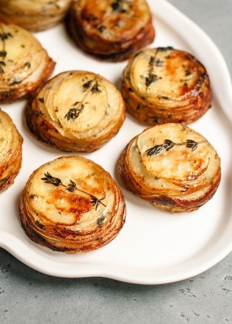 Vegetarian Recipes For Thanksgiving, Buttery Potatoes, Pommes Anna, Potato Stacks, Flakey Salt, Gold Potatoes, Garlic Herb Butter, Small Potato, Yukon Gold