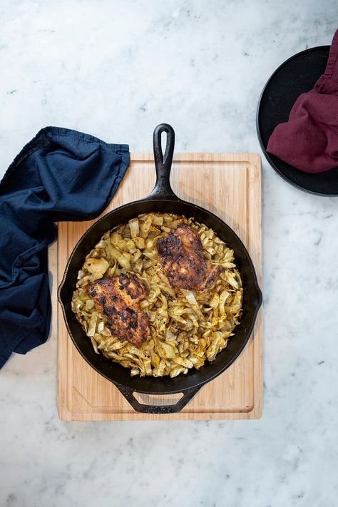 One-Skillet Chicken Thighs with Cabbage Chicken Thigh Cabbage Recipes, Chicken Thigh Recipes Cast Iron Skillet, Cajun Cabbage Skillet, Skillet Chicken Thighs And Mushrooms, Chicken Thigh And Artichoke Recipes, Skillet Chicken Thighs, Shredded Cabbage, Roasted Chicken Thighs, Chicken Skin