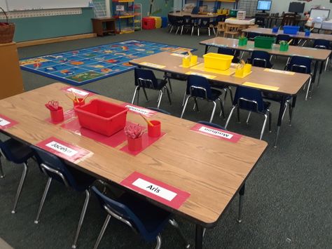 Color tables set up and ready for the First day of School. Kindergarten Classroom Table Storage, Classroom Set Up With Tables, 3rd Grade Classroom Setup With Tables, Classroom With Tables Instead Of Desks, Classroom Layout With Tables, Classroom Table Setup, Table Classroom Set Up, Preschool Table Set Up, Table Supplies Classroom