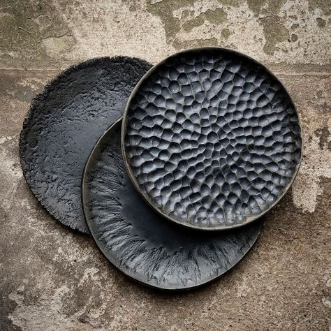 plates 20 cm d stoneware, handcarved and glazed with black satin… | Instagram Handmade Plate Pottery, Textured Plates Ceramics, Unique Dinner Plates, Black Ceramics Pottery, Black Clay Plates, Carved Plate Ceramic, Black Ceramic Plates, Texture On Pottery, Ceramic Dinnerware Set Handmade