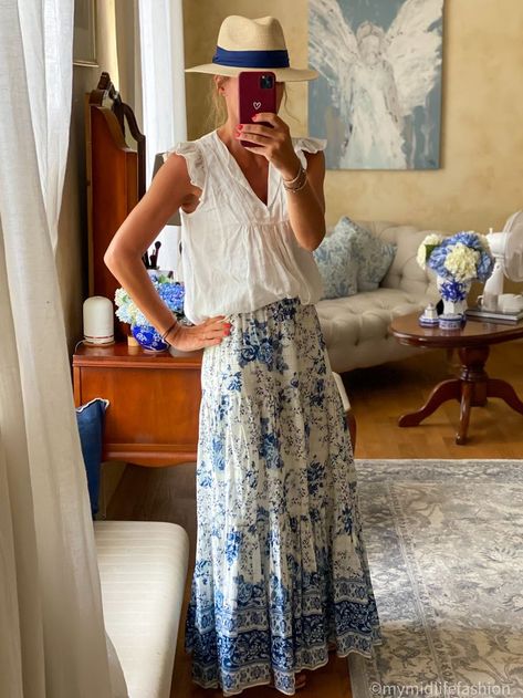 How to wear florals with a linen ruffle blouse & maxi skirt . . . #ootd #wiw #lotd #over40 #over40fashion #fashion #midlifestyle #over40style #midlife #whattowear #howtostyle #style #stylingtips #summerstyle #looksforsummer #summerfashion #whattowearinsummer #summerstylingtips #summerlooks #ideasonwhattowearinsummer Blue And White Floral Skirt Outfit, Blue And White Maxi Skirt Outfit, Long Skirt Outfits 2024, White Maxi Skirt Outfit, Long Skirt Outfits For Summer, Floral Skirt Outfits, Skirt Ootd, Fashion Over 50 Fifty Not Frumpy, Summer Holiday Outfits