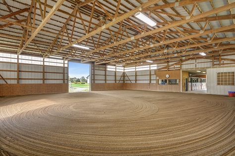 Light and bright indoor riding arena Indoor Arena Exterior, Indoor Horse Riding Arenas, Indoor Riding Arenas, Small Indoor Arena Horse, 10 Acre Horse Farm Layout, Riding Arena Indoor, Indoor Arena Horse, Indoor Horse Riding Arena, Ranch Inspiration