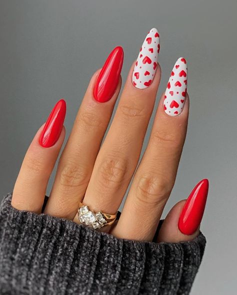 We’re thrilled to share a roundup of 65 Valentine’s Day nails that will make you fall head over heels. From the super cute to the daringly bold, we’ve got you covered, whatever your plans may be. #pinkvalentinesnails #heartnails #redvalentinesnails #cutevalentinesnails Rave Nails, Romantic Nails, Long Nail Designs, Almond Nails Designs, Almond Nail, Winter Nail Designs, Heart Nails, Valentine's Day Nails, Nail Shapes