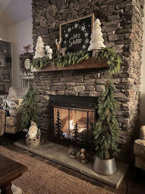 Tree By Fireplace Christmas, Farm Curb Appeal, Open Living Room And Kitchen And Dining, Rustic Fireplace Christmas Decor, Rustic Cabin Mantle Decor, Winter Themed Home Decor, Christmas Mantel Decorating Ideas 2022, Rustic Farmhouse Fireplace Stone, 75 Inch Tv On Wall Ideas With Fireplace