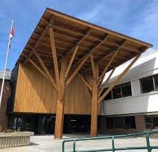 Quebec, Canada: the Heart of Mass Timber Construction | ArchDaily Glulam Beams, Mass Timber, Construction Images, Timber Architecture, Saint Gobain, Community Halls, School S, Wooden Arch, Wooden Buildings