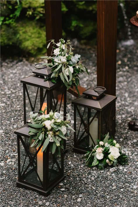 Stunning Lantern Wedding Decorations on a Budget Black Lantern Wedding, Black Lantern Centerpiece, Lantern Wedding Decor, Stair Decorations, Decorate Lantern, Lanterns With Flowers, Wedding Decor Flowers, Wedding Aisles, Lanterns Wedding