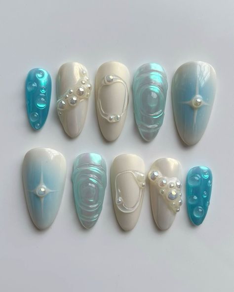 📌Choose new designs for this spring 📌book your appointment 📆 Summer Nails Mermaid Effect, Pastel Press On Nails, Gel X Nails Short Almond, Blue To White Nails, Nail Art Book, Blue Shell Nails, Cute Nail Ideas Blue, 3d Beach Nails, 3d Nail Designs Summer