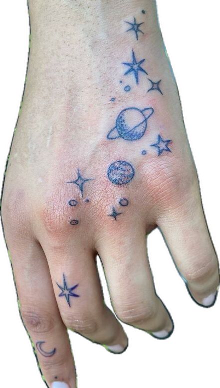 Blue planets and stars tattoos on the hand Blue Star Tattoo, Rose And Dagger Tattoo, Realistic Owl Tattoo, Tattoos On Hand, Simple Hand Tattoos, Black Line Tattoo, Simple Flower Tattoo, Twin Tattoos, Butterfly Hand Tattoo