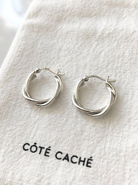 Relaxed Braid Hoop Earrings, by Côté Caché. Braided Hoops with a more relaxed feel. Less turns around the core mean a less busy impression, for a laid back alternative to traditional hoops.   ✦ Material : Sterling Silver ✦ Dimensions : W21mm X L21mm X T3.8mm (This is for Silver. Check our shop for the Gold version) ✦ Gift box included. ✦ Free UK Postage on orders over £49. ✦ International postage available. Reveal your hidden side, with Côté Caché. ~ Every Côté Caché piece is exclusively designe Hoop Earrings Aesthetic, Earrings Aesthetic, Spiral Earrings, Jewellery Uk, Large Earrings, Earrings Collection, Earrings Sterling Silver, Jewelry Earrings Hoops, Silver Hoops