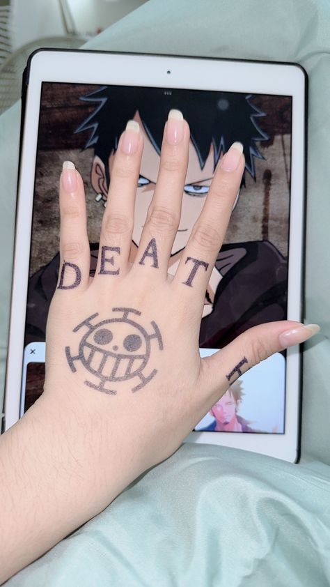 law hand tattoo one piece trafalgar law tattoo Tato Law One Piece, Laws Hand Tattoo, Law Tatoos One Piece, Law One Piece Hand, Tato Law, Law Tattoo One Piece Hand, Trafalgar Law Hand Tattoo, Anime Hand Tattoo Ideas, Laws Tattoos One Piece