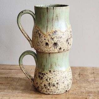 Cody Sones Pottery - Maycos aurora green over sandstone. One of my new favorite glaze combinations.  😍😍  #codysonespottery #maycocolors #auroragreen #sandstone #coffeemug #stoneware #cone6 #glazecombo | Facebook Glaze Combinations, Pottery Glazes, Aurora, Stoneware, Glaze, Coffee Mugs, Ceramics, Green, Color