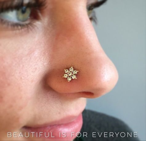 We love this beautiful flower our client Piper picked out for her nose piercing. There is much amazing nose jewelry available these days! Nose Pins Designs, Gold Nose Pin Studs, Nosepins Indian Gold, Nose Ring Stud Gold, Flower Nose Piercing, Nose Pin Designs, Nose Pin Indian, Nose Tattoo, Flower Nose Stud