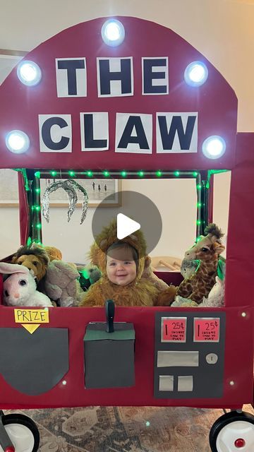 8.2M views · 720K likes | Kenzie & Carol Carter on Instagram: "THE CLAW 👻🎃 Elle’s first Halloween costume! 🦁Had so much fun recreating this idea I saw on Tik Tok! 🤍what are y’all dressing up as?!   Inspo from Tik Tok video creator(@ angelina_lesliemarie )🤩 #babyhalloweencostume" The Claw Halloween Costume, Claw Machine Costume Wagon, Claw Machine Halloween Costume, The Claw Costume, Wagon Halloween Ideas, Claw Machine Costume, Wagon Costume, First Halloween Costumes, Tik Tok Video