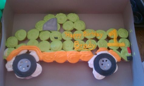 Truck cupcake cake | Truck cake for 1st Birthday party Truck Cupcake Cake, Tractor Cupcake Cake, Cake For 1st Birthday, Monster Truck Cupcakes, Tractor Cupcakes, Truck Cupcakes, Birthday Cupcakes Boy, Transportation Birthday Party, Birthday Cupcakes Decoration