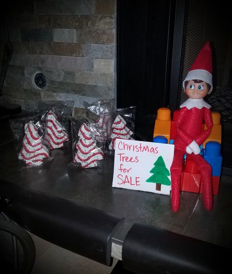 Elf On Shelf With Christmas Tree Cakes, Little Debbie Christmas Tree Cakes Elf On The Shelf, Elf Christmas Trees For Sale, Elf On The Shelf Ideas Trees For Sale, Elf With Christmas Tree Cakes, Elf On The Shelf Christmas Tree Cake Ideas, Elf On The Shelf Christmas Tree Cakes, Elf Pranks, Elf On Shelf Letter