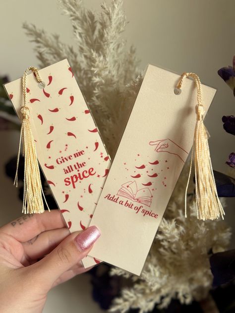 Bookmarks but make it spicy 🌶️  This bookmark pack  is double sided & laminated. Comes with a cute tassel on the ends. Spicy Bookmark Ideas, Bookmark Ideas Aesthetic, Bookmarks Christmas, Bookish Bookmarks, Bookmark Aesthetic, Make Bookmarks, Aesthetic Bookmarks, Cute Bookmark, Christmas Bookmarks