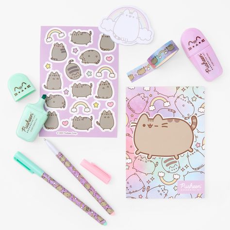 Like magic, this sweet stationery set featuring rainbows and Pusheen® will brighten your day! The set includes a notebook, pens, highlighters, stickers, and more. With matching supplies, you can be stylish out of school and IN school. Stationery Set by Pusheen® Included: 1 notebook, 1 sticker sheet, 1 sticky note pad, 1 tape roll, 2 highlighters, 2 pens Material: Plastic, Paper Suitable for ages 3+ - Claire's Pusheen® Stationery Set Pusheen Stationery, Pusheen Collection, Stationary Craft, Pusheen Cute, Barbie Doll Set, Cute School Stationary, Pusheen Cat, Cute Stationary, Cute School Supplies