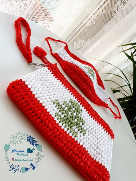 • Crochet mask in lebanese flag handmade.New. • Crochet handbag in lebanese flag handmade.New. • The handbag is small, handy , lined and with zip. • Crochet handbag size: 18.5 cm × 12 cm. • They made from 100% Cotton yarn. Lebanese Art, Lebanese Flag, Lebanon Flag, Mini Oil Painting, Crochet Mask, Crochet Handbag, Crochet Fingerless Gloves, Crafty Diy, Crochet Handbags