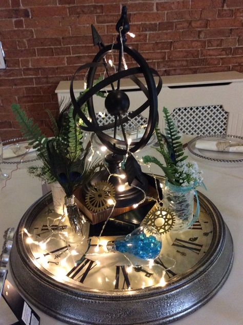 Steampunk Table Decor, Steampunk Centerpieces Diy, Steampunk Theme Party, Steampunk Flower Arrangements, Steampunk Party Decor, Clock Centerpieces, Victorian Party Theme, Steam Punk Party, Steampunk Centerpiece