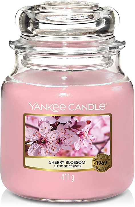 A medium, pink, cherry blossom scented candle Snowflake Cookie, Yankee Candle Christmas, Christmas Fragrance, Good Burns, Snowflake Cookies, Glass Apothecary Jars, Pink Icing, Cocoa Bar, Jar Candle