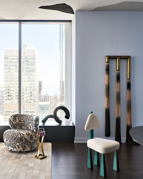 In the art-laden living and dining spaces, Svenstrup favored sculptural furnishings. Here, a Siriano Interiors dining chair and France & Son swivel chair covered in Dedar��’s Tiger Mountain motif set off a cast-bronze sculpture by Dominique Mercy and fiber art by Lauren Williams. Contemporary Penthouse, Tiger Mountain, Apartment Projects, Bachelor Pad, Luxe Interiors, Contemporary Dining Chairs, Sofa Upholstery, Interiors Design, Interior Design Portfolio