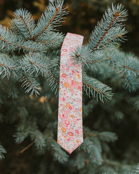 Our ever popular Pink Meadow Tie just hanging out! #DAZI #daziusa #floraltie #spring #springfashion Blue Suit With Floral Tie, Wildflower Wedding Groomsmen, Wedding Extras, Groom Ties, Wedding Groomsmen, Wedding Fun, Cool Ties, Wildflower Wedding, Wedding Ties