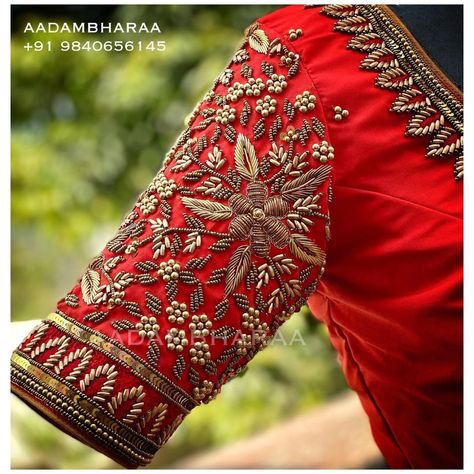 aadambharaa designer bridal on Instagram: “This red bridal blouse from Aadambharaa with hand embroidered golden flowers and Zardosi leaves and motifs is the perfect blend of elegance…” Dhaare Saree, Red Bridal Blouse, Traditional Saree Blouse Designs, Green Blouse Designs, Pink Blouse Designs, Silk Saree Blouse Designs Patterns, Blouse Tops Designs, Blouse Designs High Neck, Blouse Designs Catalogue