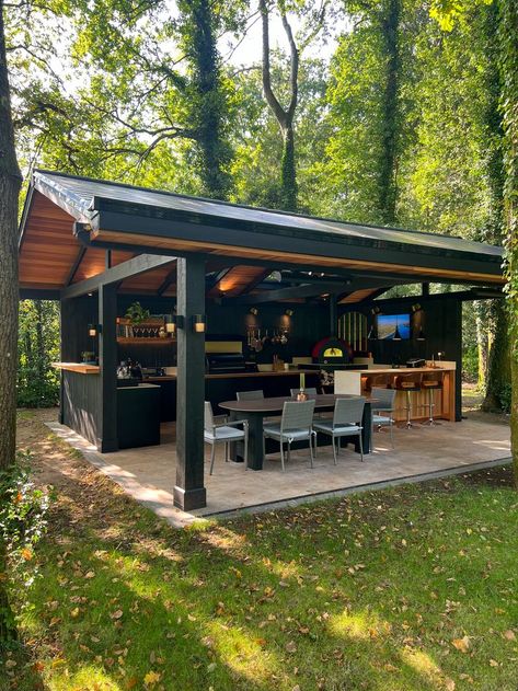 Have a look at this luxury outdoor kitchen!🤩This blank patio was transformed into the ultimate outdoor living space with the client's dream garden kitchen.🔥Featuring 2 built in BBQ grills, a pizza oven, a garden bar, and an outdoor dining area, this outdoor living area is the ideal spot for hosting a garden party or experiment with BBQ recipes.🧑‍🍳For more backyard patio designs, patio layout ideas and garden designs, check out our feed.👀If you're interested in a BBQ kitchen, contact us!📲 Patio Layout Ideas, Luxury Outdoor Living, Luxury Outdoor Kitchen, Modular Outdoor Kitchens, Patio Grill, Patio Layout, Built In Bbq, Garden Bbq, Bbq Kitchen