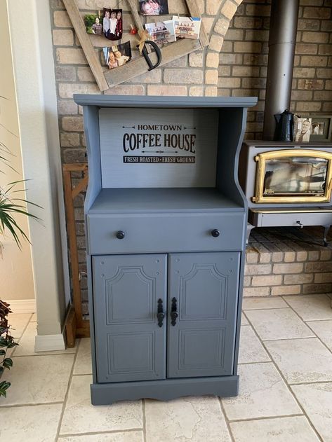 The coffee bar is painted with Fusion Mineral  and custom Soap Stone & Little Lamb. It is laser engraved with the Hometown Coffee House emblem. Microwave Cart Makeover, Microwave Cart, Country Primitive Decor, Soap Stone, Microwave Stand, Coffee Bar Home, Vintage Farmhouse Decor, Primitive Decor, Country Primitive