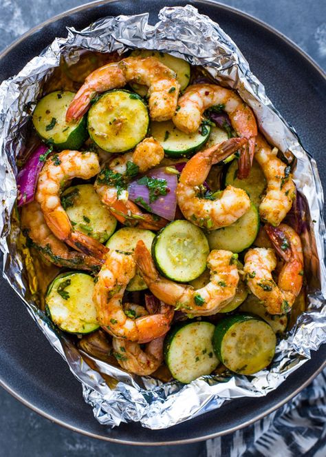 Garlic Shrimp and Veggie Foil Packscountryliving Shrimp And Zucchini, Foil Wraps, Gimme Delicious, Foil Pack Meals, Foil Packet Meals, Cilantro Sauce, Garlic Shrimp, Grilled Shrimp, Tex Mex