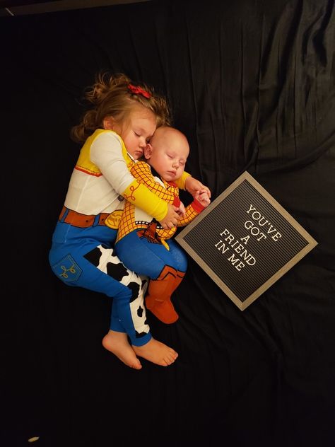 Toy story siblings Halloween sleeping baby you've got a friend in me Toy Story Sibling Costumes, Toy Story Milestone Picture, Sibling Halloween Pictures, Sibling Halloween Photoshoot Ideas, Toy Story Monthly Photo, Halloween Sibling Photoshoot, Toy Story Newborn Photography, Sister And Baby Brother Halloween, Toy Story Newborn Pictures