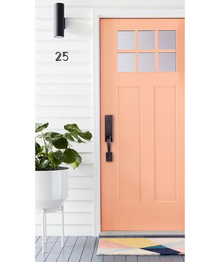 Modern | These impactful home makeovers take just a few design swaps and a splash of paint. Coral Front Doors, Coral Door, Pink Front Door, Painting Guide, Home Door Design, Pink Door, Painted Front Doors, Home Door, Exterior Makeover