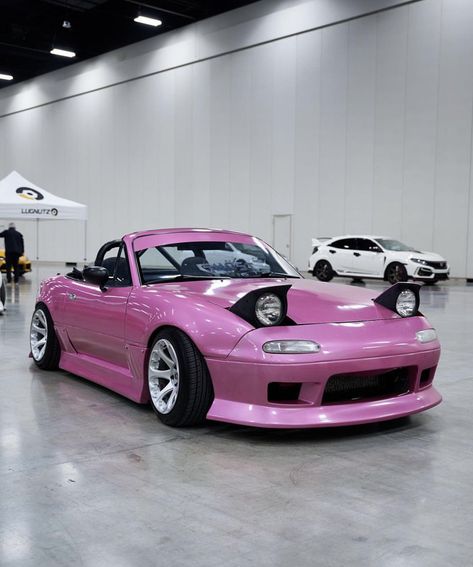 Pink Miata Mx5, Mazda Miata Mx5 1990, Mazda Aesthetic, Pink Miata, Pop Up Headlights, Car Expensive, 1990 Aesthetic, Car Motivation, Mx5 Mazda