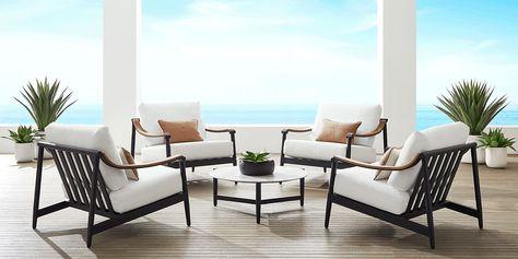 Cool, modern confidence radiates from the swooping curves of the Harlowe chat seating set from Cindy Crawford Home to create a space where connection and relaxation stretch long, long, long into the night. The deep slant of each seat promises indulgent luxury, while the tailored cushions in UV-resistant white fabric offer added support and style. Weather-resistant aluminum frames in black are accented with sloped arms topped in teak, all standing on smooth tapered legs and back posts. A large co Modern Outdoor Dining Sets, Gray Patio Furniture, Cindy Crawford Home, Outdoor Seating Set, Teak Sofa, Backyard Furniture, Outdoor Sofa Sets, King Bedroom Sets, Minimalist White