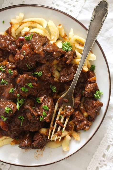 A classic recipe for German Goulash, just the way my German mother-in-law makes it. Tender chunks of beef in a rich, hearty, delicious gravy. #whereismyspoon #germangoulash #germangoulashrecipe #authenticgermangoulash #germanrecipes #goulashrecipes #germanbeefgoulash Authentic German Goulash, Beef Goulash Recipes German, Gulasch Beef Goulash Recipes German, Volga German Food, Austrian Goulash Recipes, German Stew Beef Goulash, German Beef Stroganoff Recipe, German Dinner Recipes Oktoberfest, Paleo German Recipes