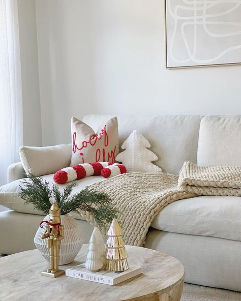 Red White And Brown Christmas Decor, White Couch Christmas Decor, Home Decoration For Christmas, Minimal Red Christmas Decor, Pop Of Red Christmas Decor, Christmas Living Room Ideas Apartment, Beige And Red Christmas Decor, Neutral Red And Green Christmas, Cream And Red Christmas Decor