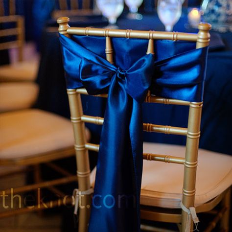 Another pretty way to tie fabric around the dining chairs (not in this color obviously) Chair Covers Wedding Reception, Royal Blue Wedding Theme, Wedding Reception Chairs, Blue Gold Wedding, Reception Chairs, Silver Bridesmaid Dresses, Silver Bridesmaid, Blue Tablecloth, Royal Blue Wedding