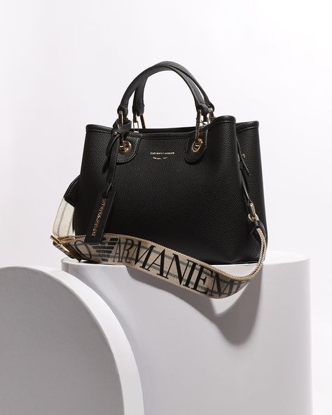 Inspired by the elegance of its couture pieces, @emporioarmani’s sleek and sophisticated Italian heritage is passed through to its accessories. Emporio Armani Bag, Armani Bag, Bling Phone Cases, Longchamp Bag, Luxury Bags Collection, Italian Heritage, Mommy Bag, Athleisure Outfits, Fashion Board