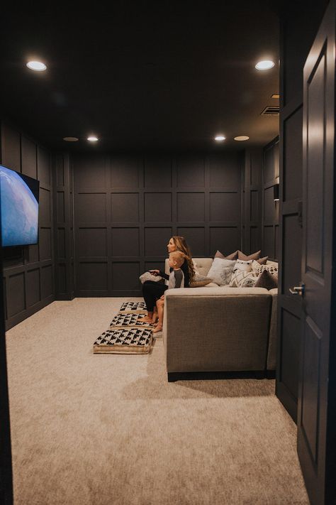 Our Dark Gray Home Theater Room With Wall Paneling Black Wall Movie Room, Bedroom Into Movie Room, Small In Home Theater Room, Movie Theater Cabinets, Theater And Game Room Ideas, Media Room Shelving Ideas, Cinema Snug Room, Media Room With Fireplace, Tv Room In Basement