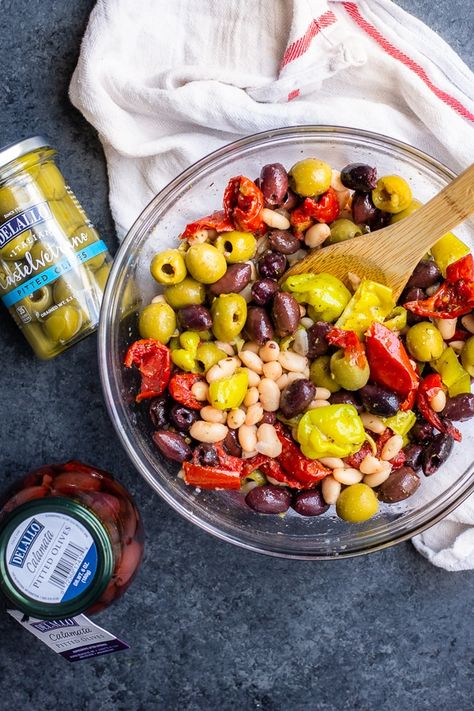 This Vegan Antipasto Salad is loaded with bold and briny olives, Italian Roasted Tomato Quarters, zesty pepperoncini peppers and creamy cannellini beans. Vegan Antipasto, Salad Supreme, Bruschetta Appetizer, Homemade Vinaigrette, Grilled Artichoke, Pepperoncini Peppers, Antipasto Salad, Italian Roast, Simple Vinaigrette