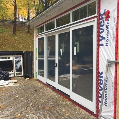 Andersen E-Series triple glaze 16’ x 8’ gliding patio door installed by our friends at Sable Building & Design #fogoisland #renovate #nlrealestate #stjohns #newfoundland #labcity #labrador #cornerbrook #gander #architecture #homedesign #patiodoor #andersenwindows Anderson Sliding Patio Doors, Bermuda House, Double Sliding Patio Doors, Anderson Doors, Patio Door Installation, Glass Doors Patio, Slider Door, Addition Ideas, Double Sliding Doors