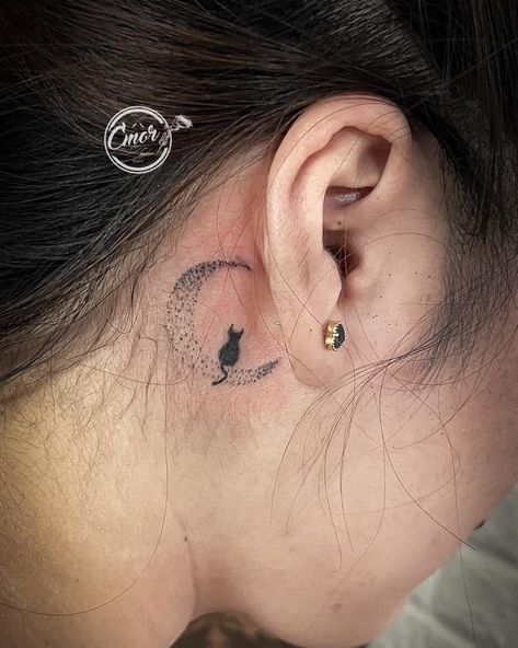 Halloween Tattoo Behind Ear, Cat Sitting On Moon Tattoo, Moon Ear Tattoo, Cat On Moon Tattoo, Moon Tattoo Behind Ear, Ear Tats, Spaceship Tattoo, Inside Ear, Cat On The Moon