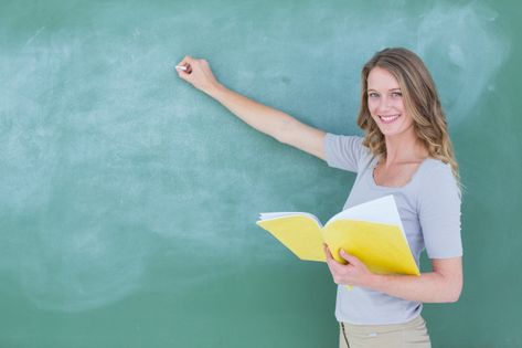 Smiling teacher writing on blackboard Pr... | Premium Photo #Freepik #photo #education #woman #light #hair Education, Writing