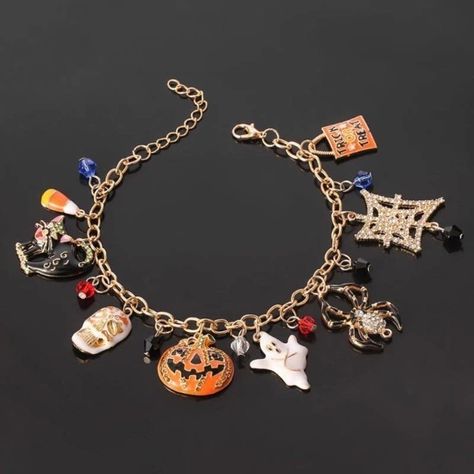 A Charm Bracelet Featuring 8 Charms And 7 Colorful Beads. Charms Include A Trick Or Treat Bag, Sparkly Spider Web, Black Spider, Ghost, Pumpkin Jack O Lantern, Sugar Skull, Black Cat, And Candy Corn. Gold Tone Zinc Alloy. Lobster Clasp Closure. Measures Approx. 20cm. Not Including Extension Chain. Bundle Two Charm Bracelets For $30 (Exclusions Apply. Check Descriptions For Details). This Item Is Brand New In Bag, An Unbranded Boutique Item. However, Please Note That It Doesn’t Come With Tags. Mu Charm Bracelet Aesthetic, Halloween Charm Bracelet, Bracelet Aesthetic, Pumpkin Jewelry, Pumpkin Mask, Halloween Bracelet, Pumpkin Spider, Halloween Charms, Aesthetic Fall