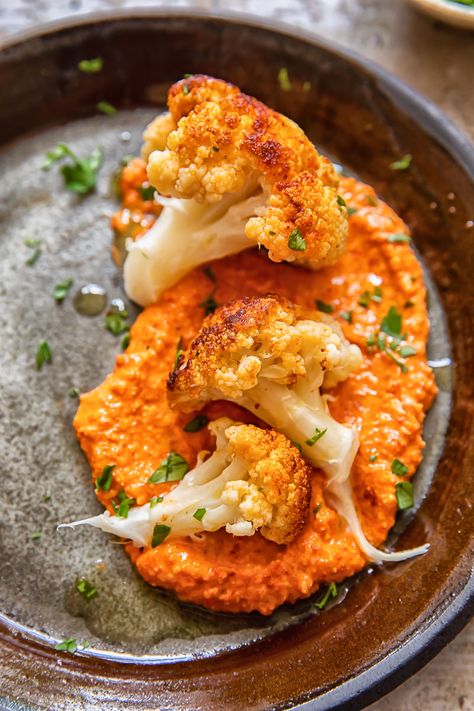 Plate of romesco sauce with three roasted florets Romesco Cauliflower, Romesco Sauce Recipe, Romesco Sauce, Whole Roasted Cauliflower, Vegetarian Sides, Food Freedom, Instant Pot Pork, Cauliflower Bites, Broccoli Cauliflower