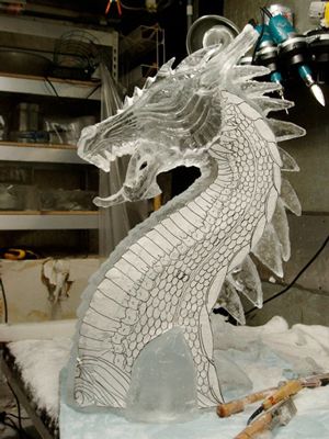 the ice dragon | the secrets blog from ice carving secrets: ice sculpting tools, techniques, designs, pictures, & more! Ice Carving, Ice Dragon, Ice Art, Snow Sculptures, Ice Sculpture, Here There Be Dragons, Cool Dragons, Snow Art, Here Be Dragons