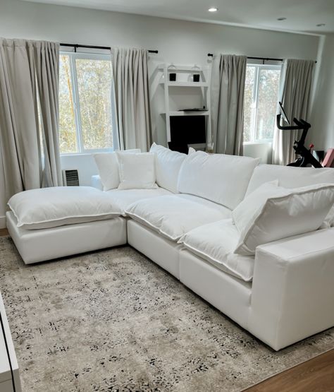 I found the best and most afforable cloud couch dupe. Find out where I got it and how I plan to keep it clean. My couch was finally delivered 6 months after I ordered it but I have to say, it was well worth the wait. Continue reading The Most Affordable Cloud Couch Dupe at The Luxe Minimalist. Throw Pillows For Cloud Couch, Comfy Fluffy Couch, Down Couches Sofas, 25 Home Couch, Nice Couches Sofas Living Rooms, White Leather Sectional Sofa, How To Keep White Couch Clean, Soft Couches Living Room, Amazon Cloud Couch